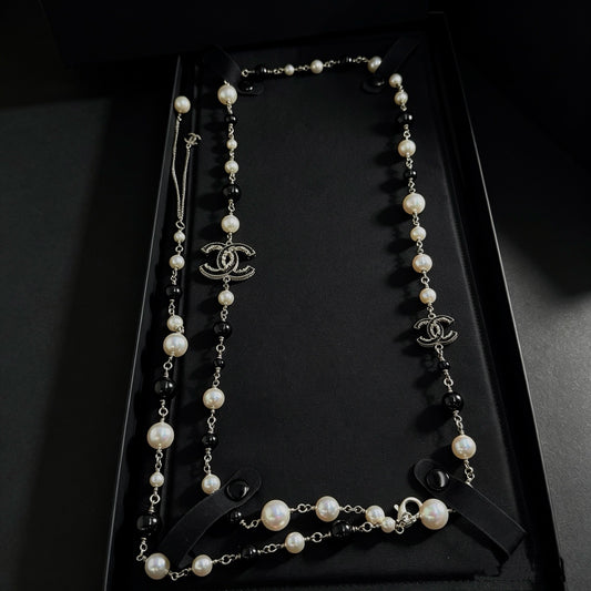 Chanel - Other - Costume jewellery metal with decorative pearl-style beads. - Multicolour