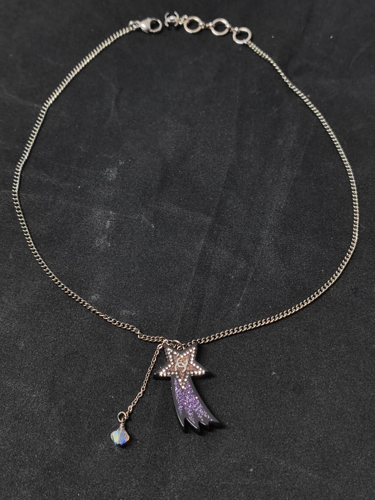 Chanel - Other - Costume jewellery metal with rhinestone embellishments and an acrylic or resin pendant. - Purple