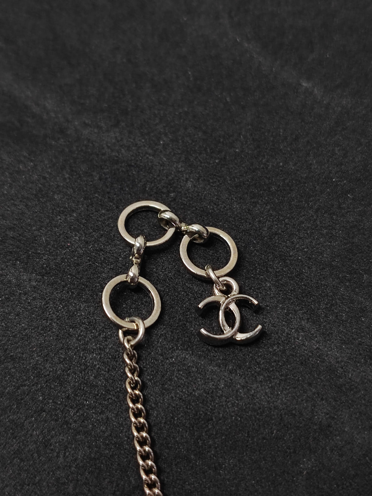 Chanel - Other - Costume jewellery metal with rhinestone embellishments and an acrylic or resin pendant. - Purple