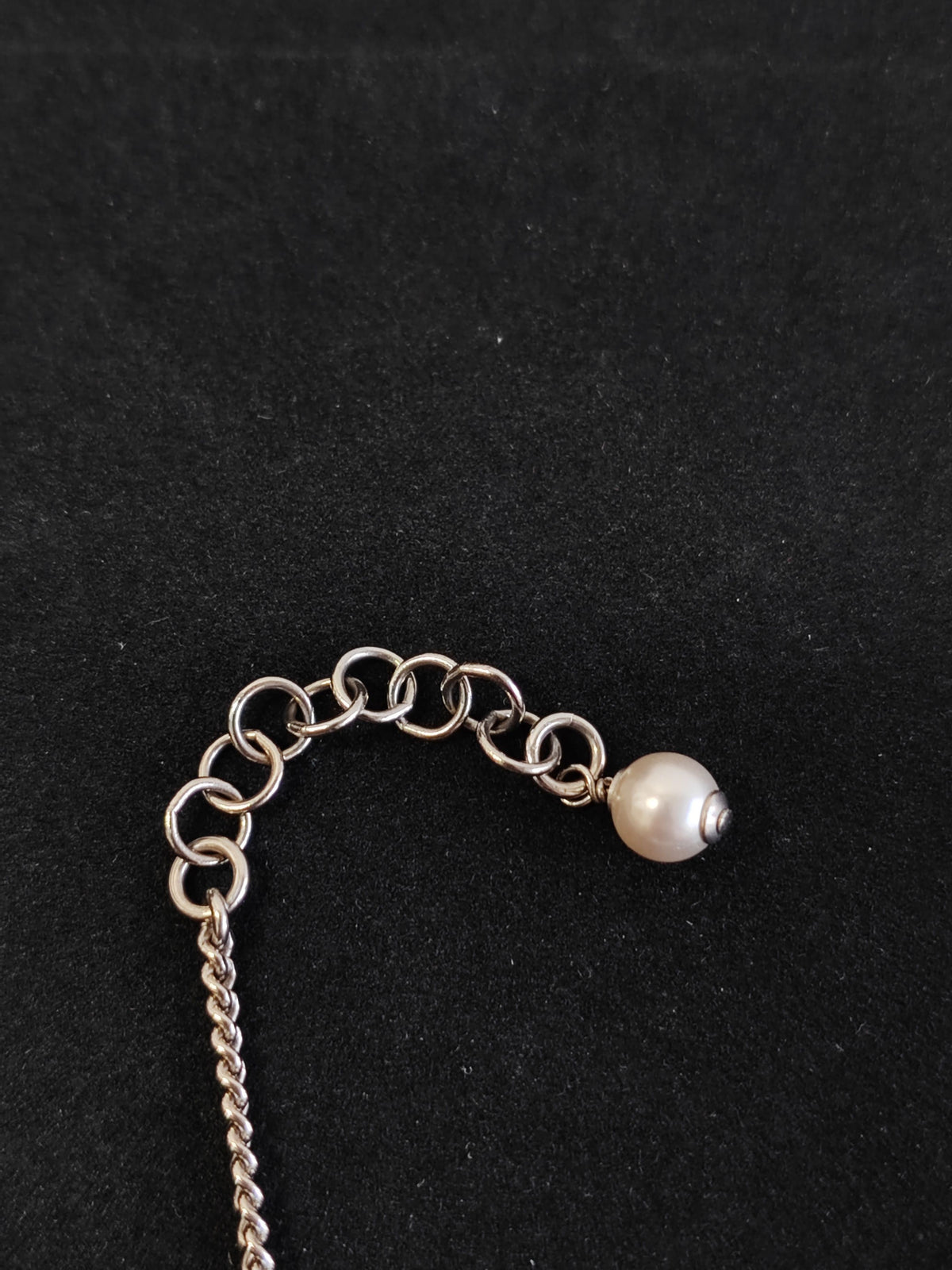Chanel - Other - Costume-jewelry metal with clear crystal-like stones and a pearl-style bead. - Silver