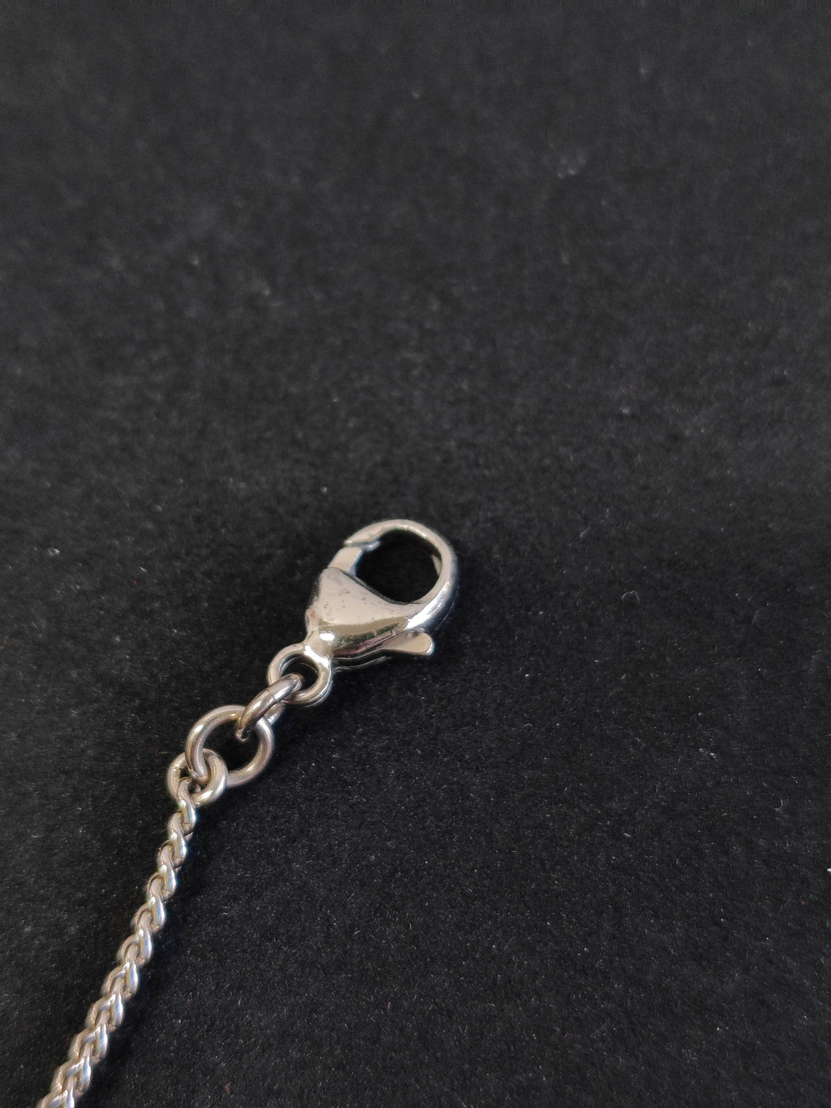 Chanel - Other - Costume-jewelry metal with clear crystal-like stones and a pearl-style bead. - Silver