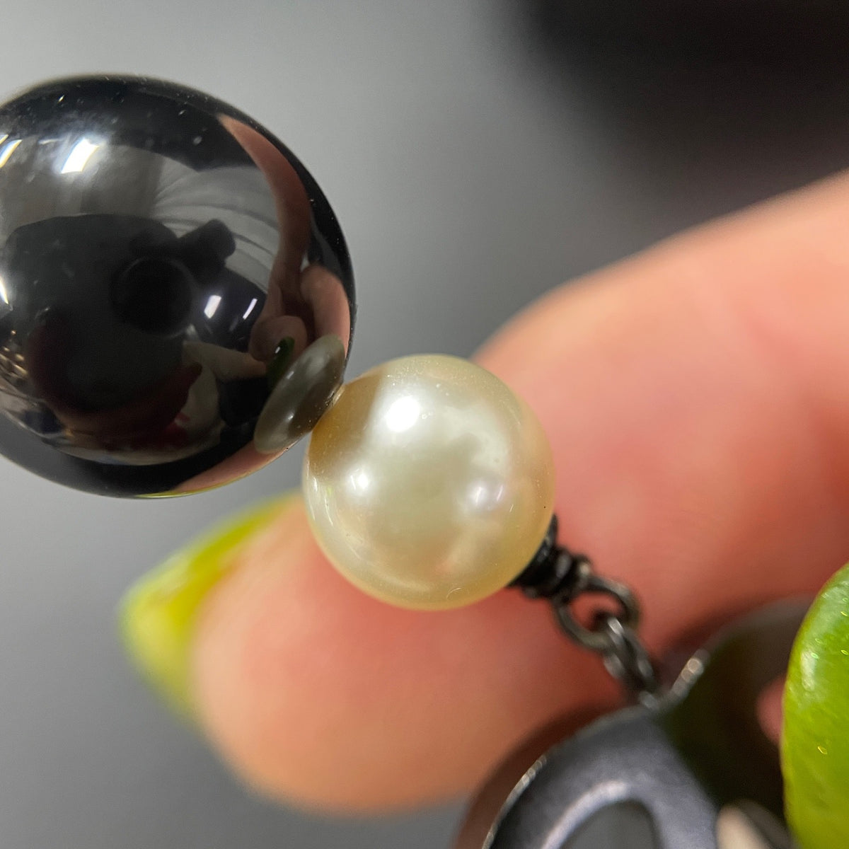 Chanel - Other - Dark-tone metal with imitation pearls and resin beads. - Multicolour