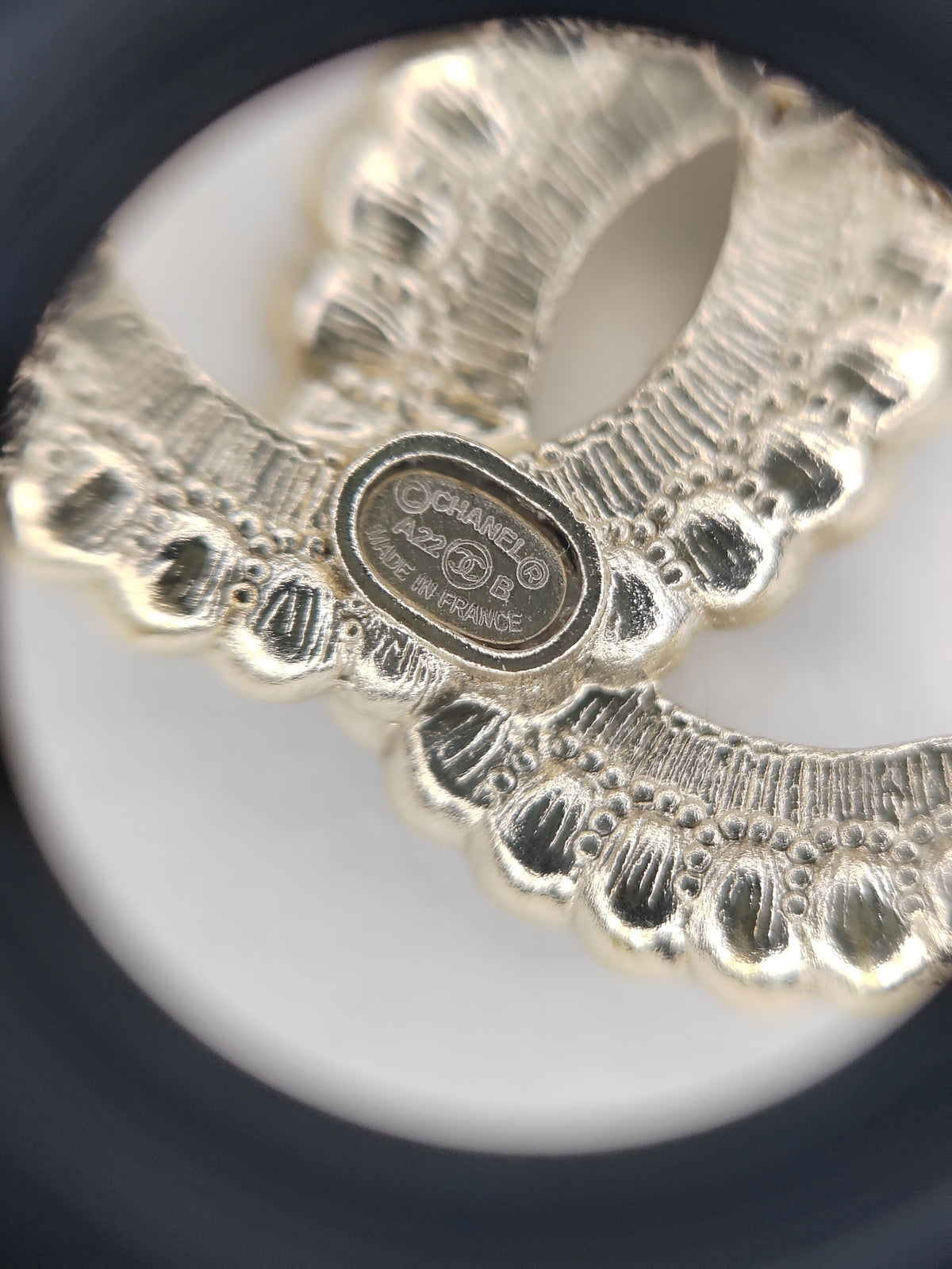 Chanel - Other - Gold-tone base metal with black and clear rhinestone embellishments. - Gold
