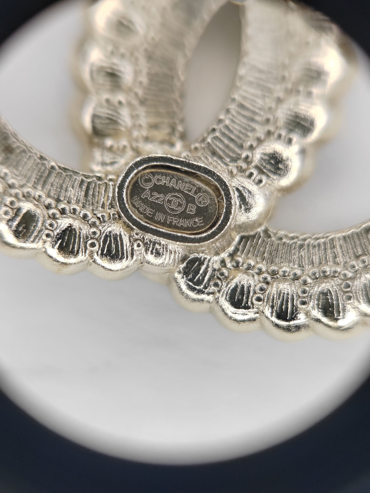 Chanel - Other - Gold-tone base metal with black and clear rhinestone embellishments. - Gold