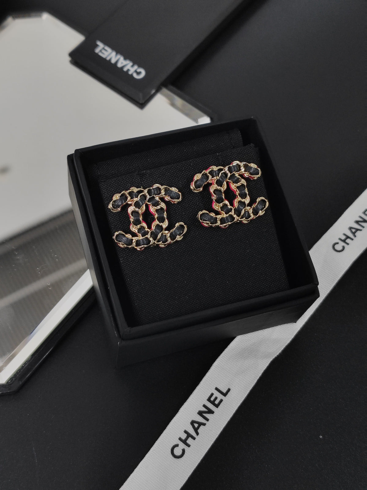 Chanel - Other - Gold-tone base metal with black and pink leather accents; precise alloy unspecified. - Multicolour