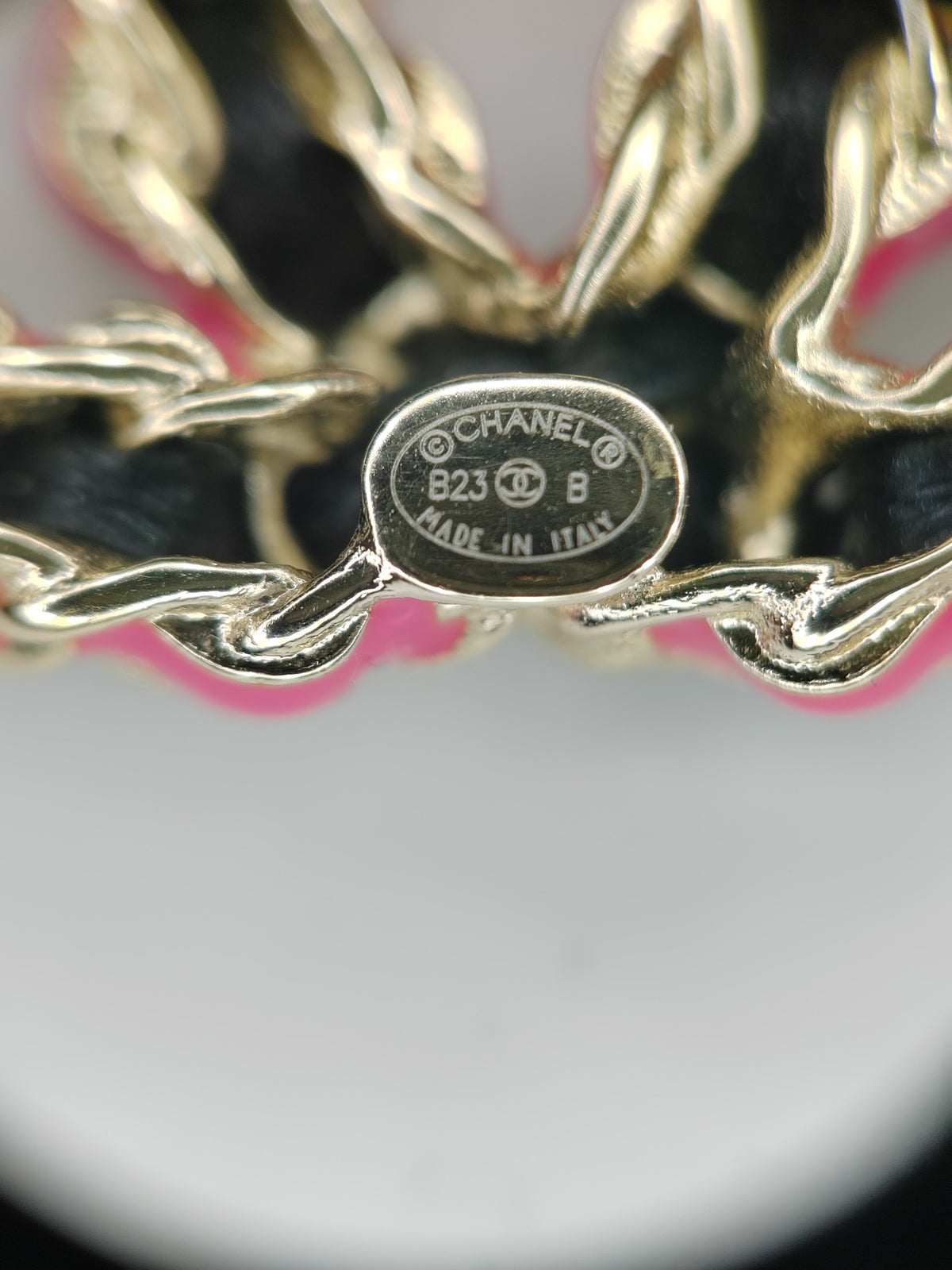 Chanel - Other - Gold-tone base metal with black and pink leather accents; precise alloy unspecified. - Multicolour