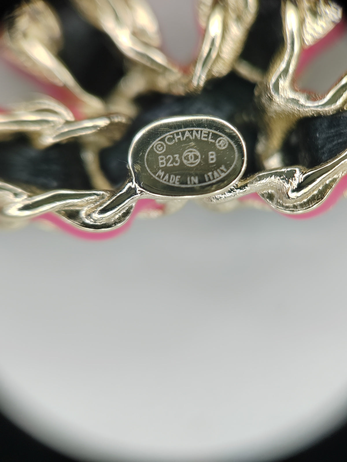 Chanel - Other - Gold-tone base metal with black and pink leather accents; precise alloy unspecified. - Multicolour