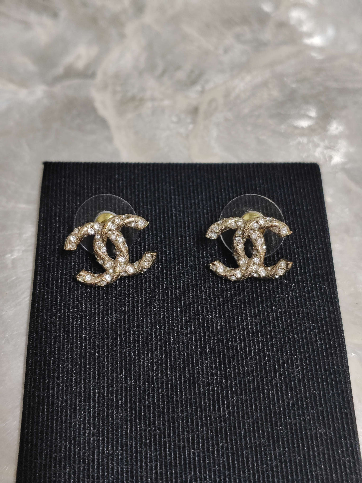 Chanel - Other - Gold-tone base metal with clear crystal embellishments. - Gold