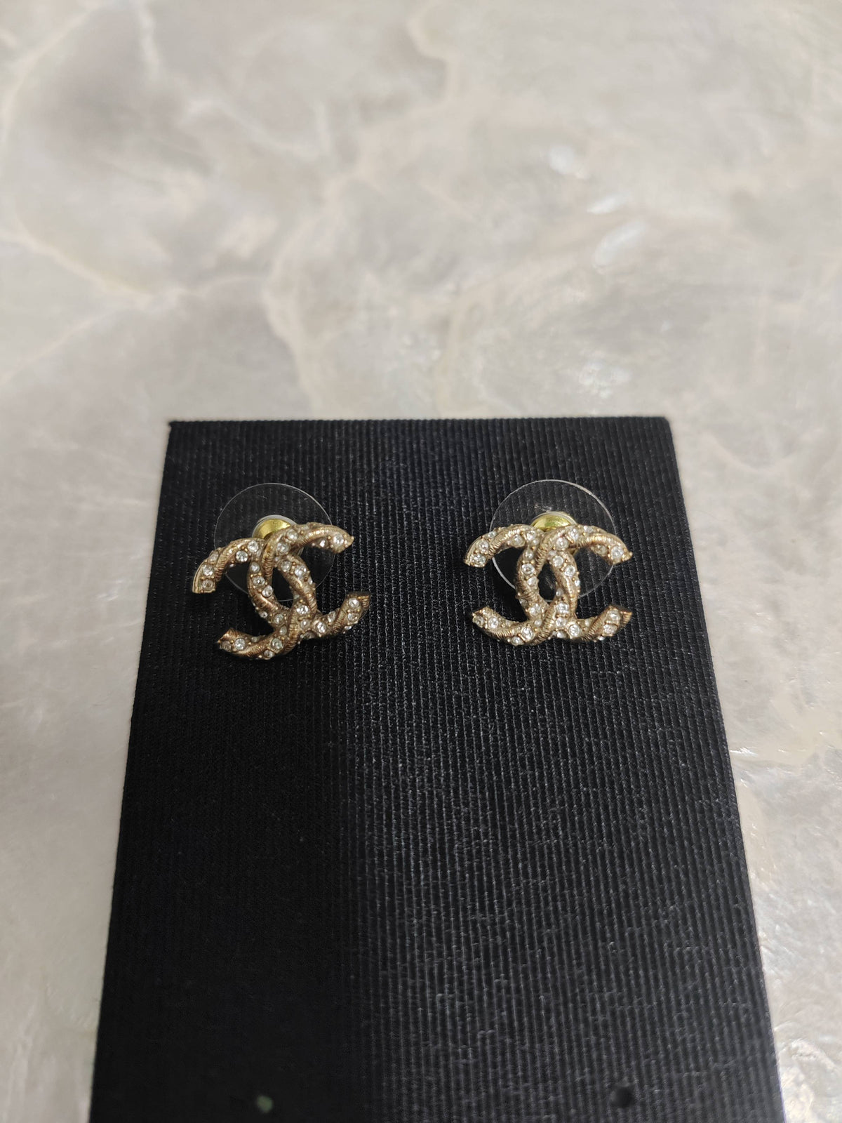 Chanel - Other - Gold-tone base metal with clear crystal embellishments. - Gold