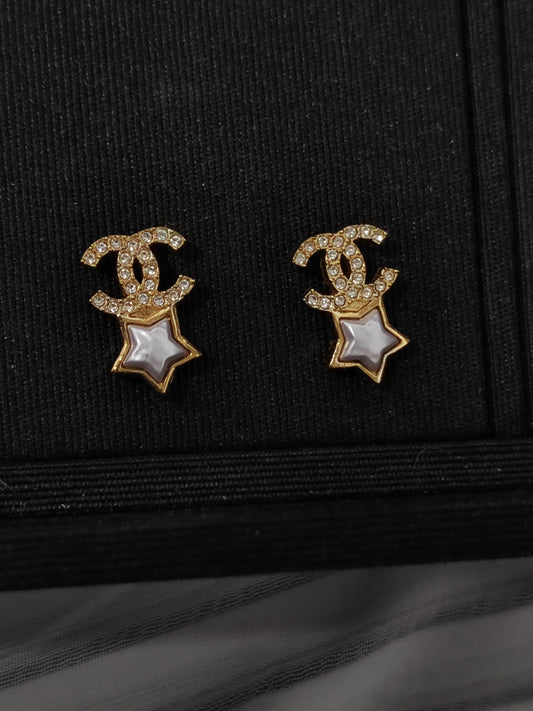 Chanel - Other - Gold-tone base metal with clear rhinestone accents and imitation pearl details. - Gold
