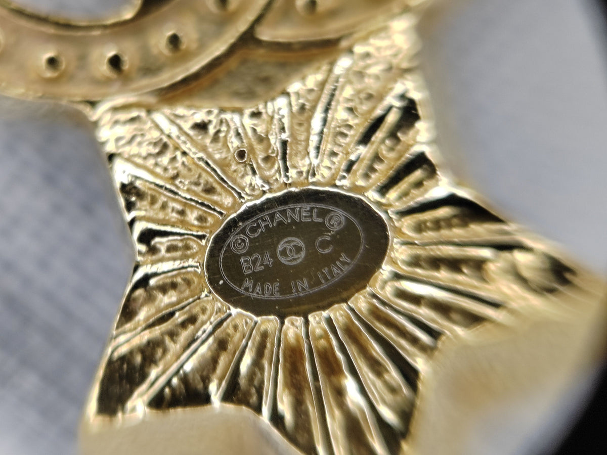 Chanel - Other - Gold-tone base metal with clear rhinestone accents and imitation pearl details. - Gold