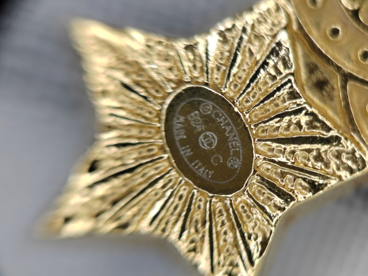 Chanel - Other - Gold-tone base metal with clear rhinestone accents and imitation pearl details. - Gold