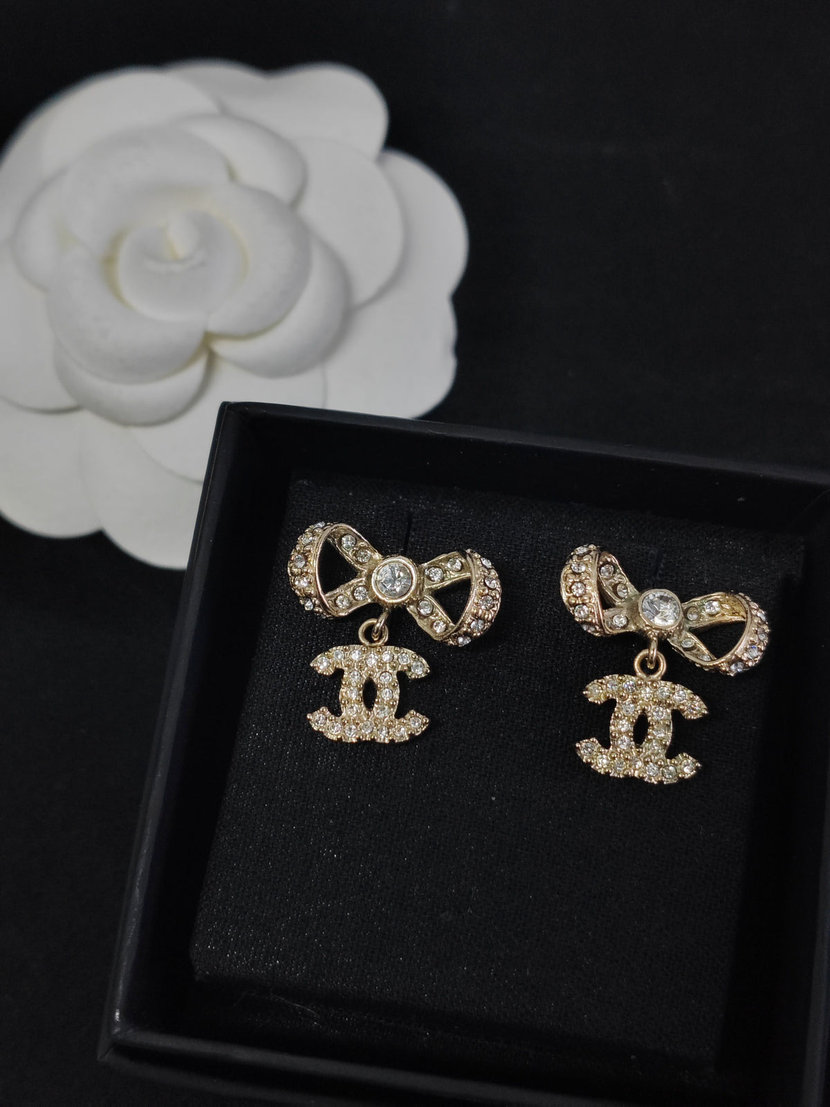 Chanel - Other - Gold-tone base metal with clear rhinestone embellishments; exact alloy and stone composition are unconfirmed. - Gold