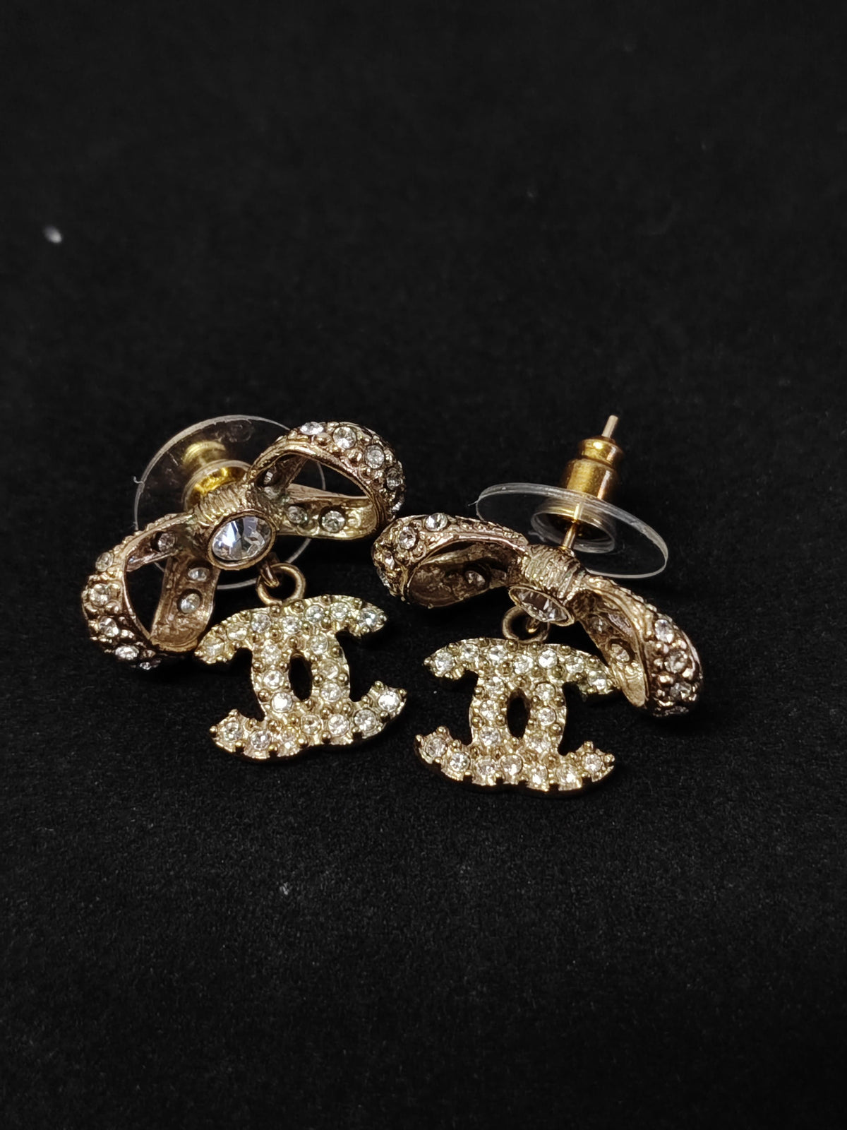 Chanel - Other - Gold-tone base metal with clear rhinestone embellishments; exact alloy and stone composition are unconfirmed. - Gold
