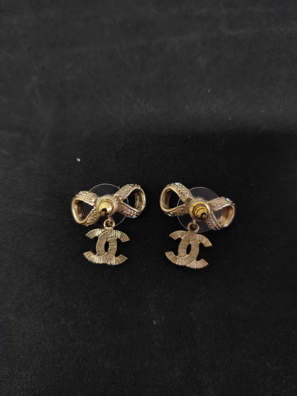Chanel - Other - Gold-tone base metal with clear rhinestone embellishments; exact alloy and stone composition are unconfirmed. - Gold