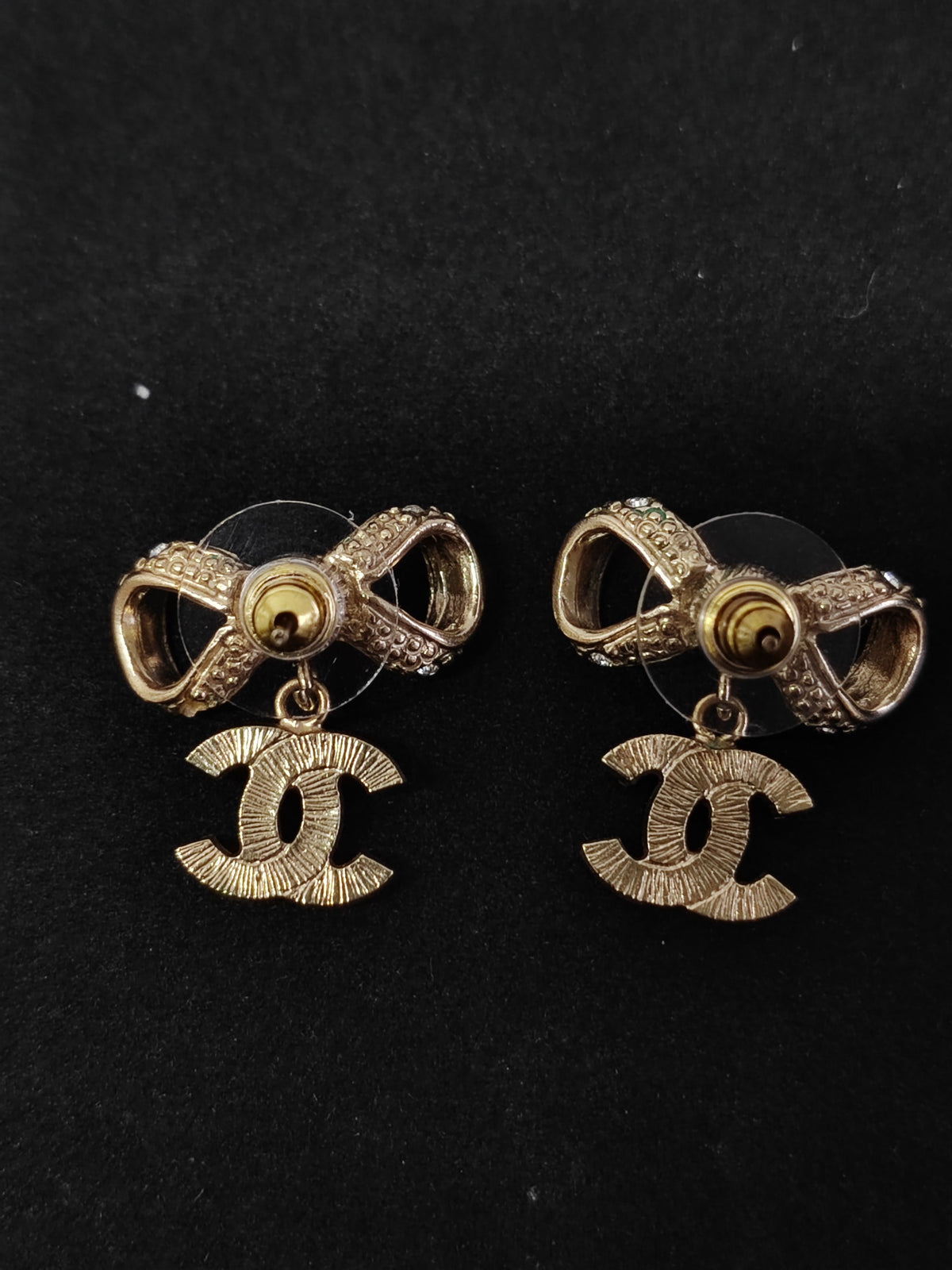 Chanel - Other - Gold-tone base metal with clear rhinestone embellishments; exact alloy and stone composition are unconfirmed. - Gold