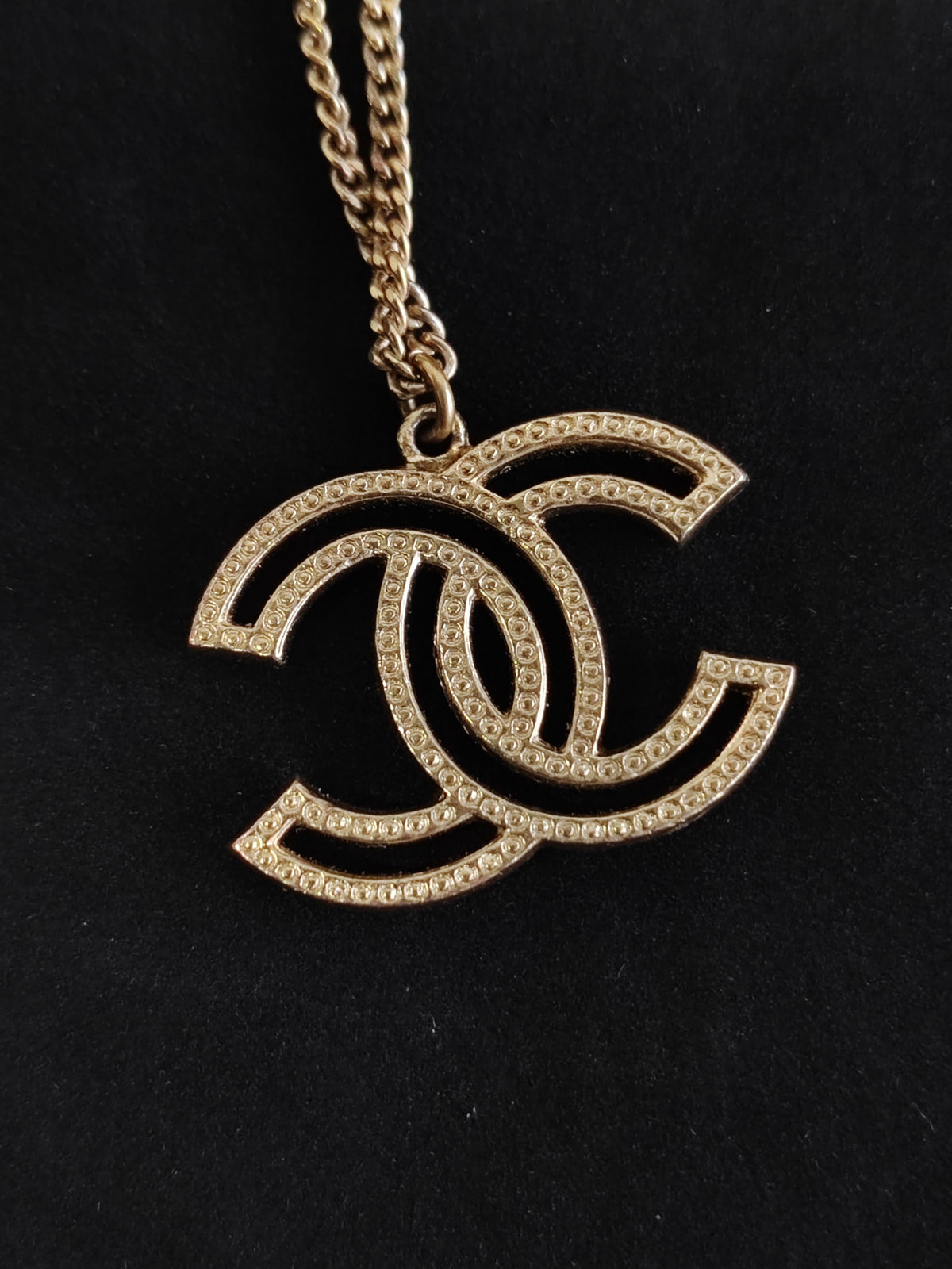 Chanel - Other - Gold-tone base metal with clear rhinestone embellishments. - Gold