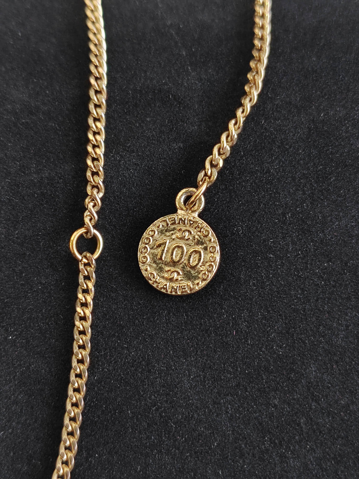Chanel - Other - Gold-tone base metal with clear rhinestone embellishments. - Gold