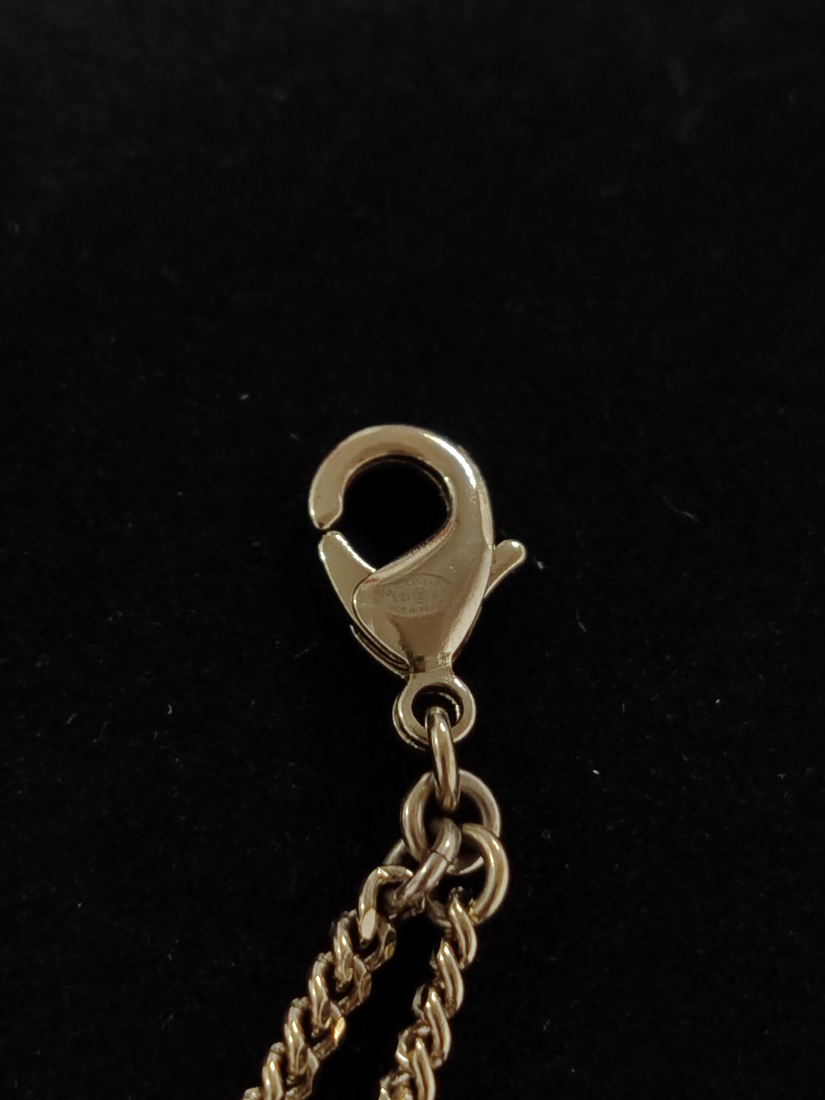 Chanel - Other - Gold-tone base metal with clear rhinestone embellishments. - Gold