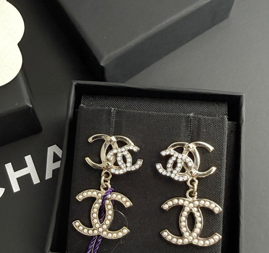 Chanel - Other - Gold-tone base metal with faux pearl and crystal-like embellishments. - Gold