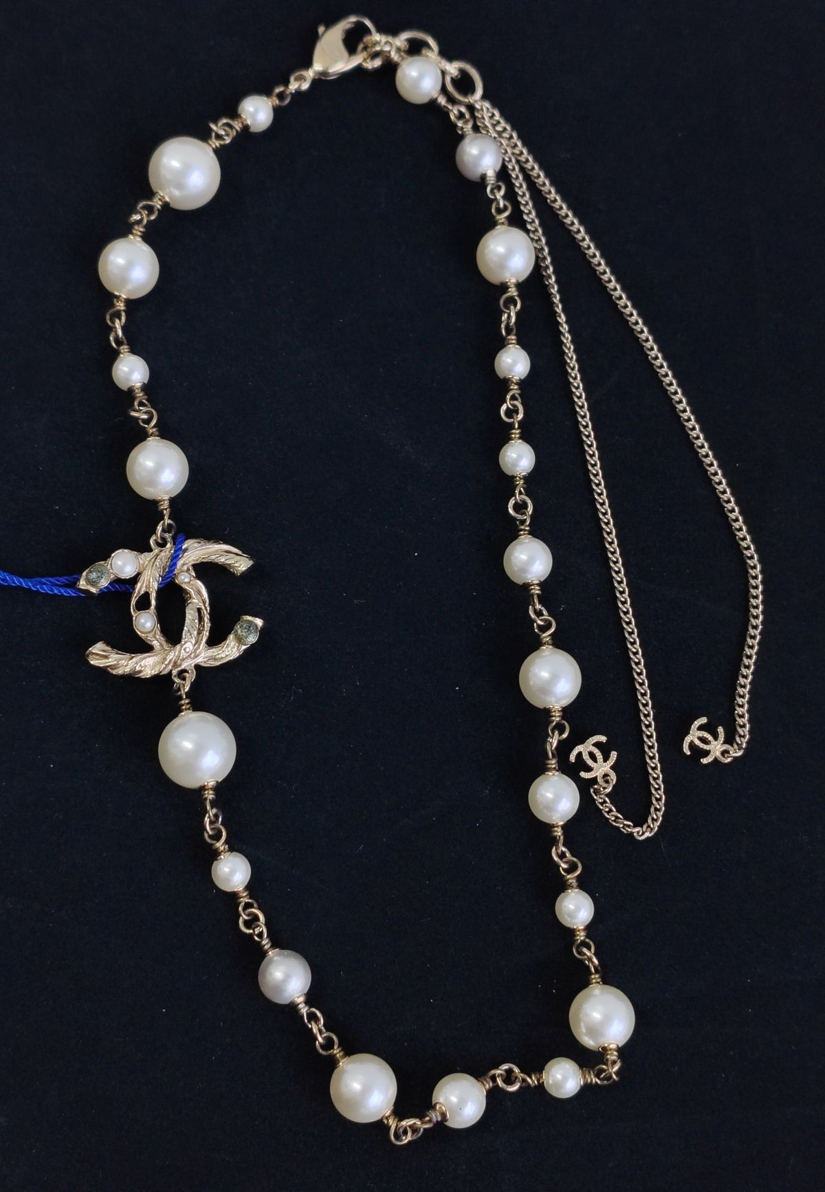 Chanel - Other - Gold-tone base metal with faux pearl embellishments. - Gold