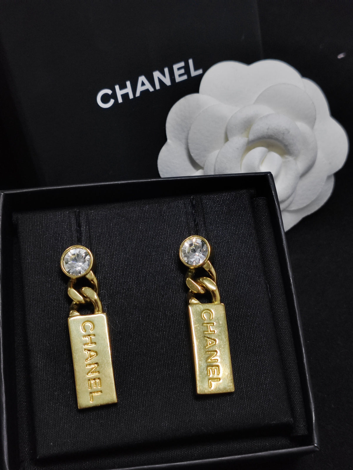 Chanel - Other - Gold-tone base metal with glass rhinestone embellishments. - Gold