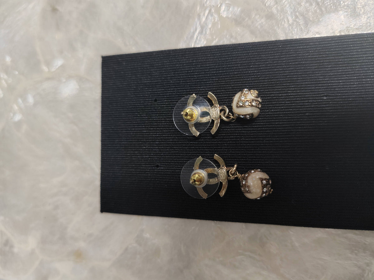 Chanel - Other - Gold-tone base metal with glass rhinestones and pale decorative bead accents. - Gold