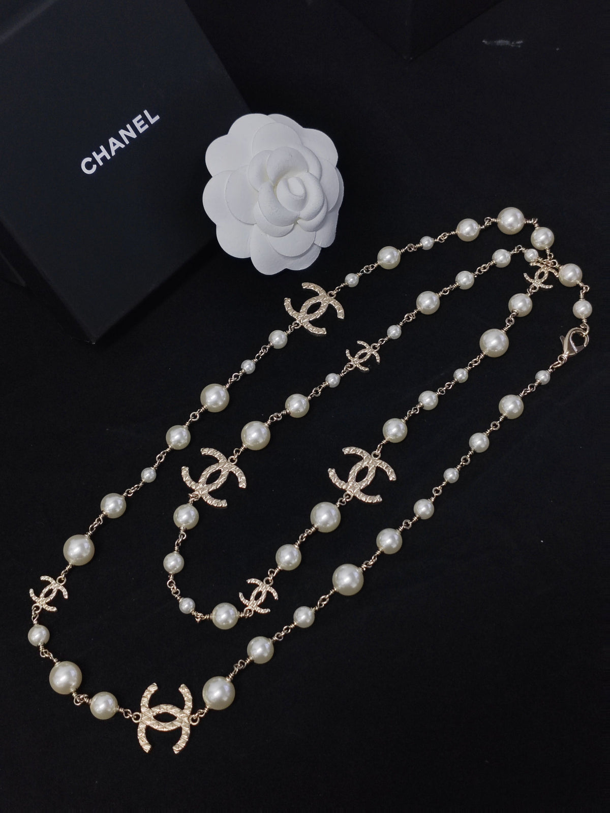 Chanel - Other - Gold-tone base metal with imitation pearl beads. - Multicolour