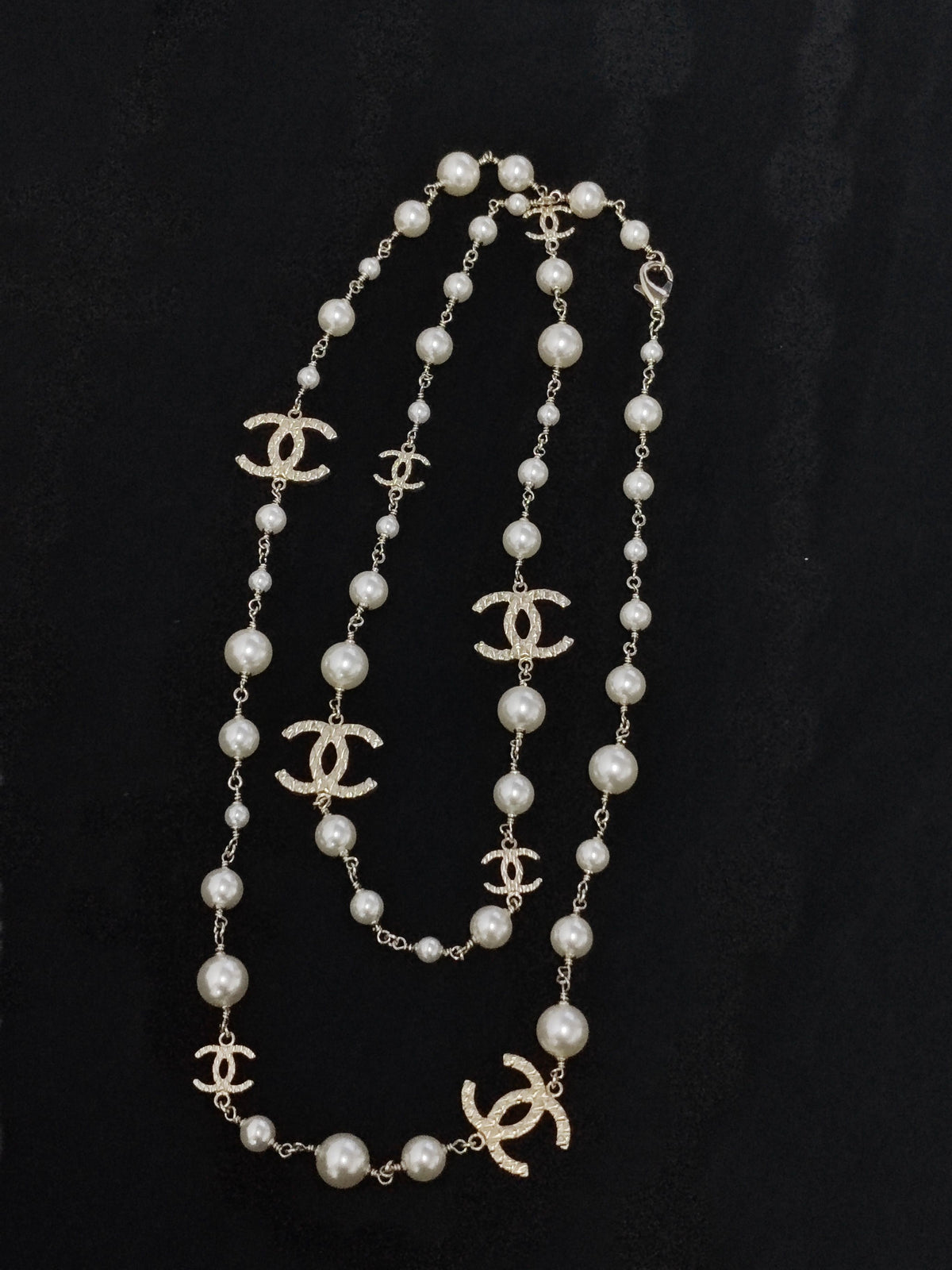Chanel - Other - Gold-tone base metal with imitation pearl beads. - Multicolour