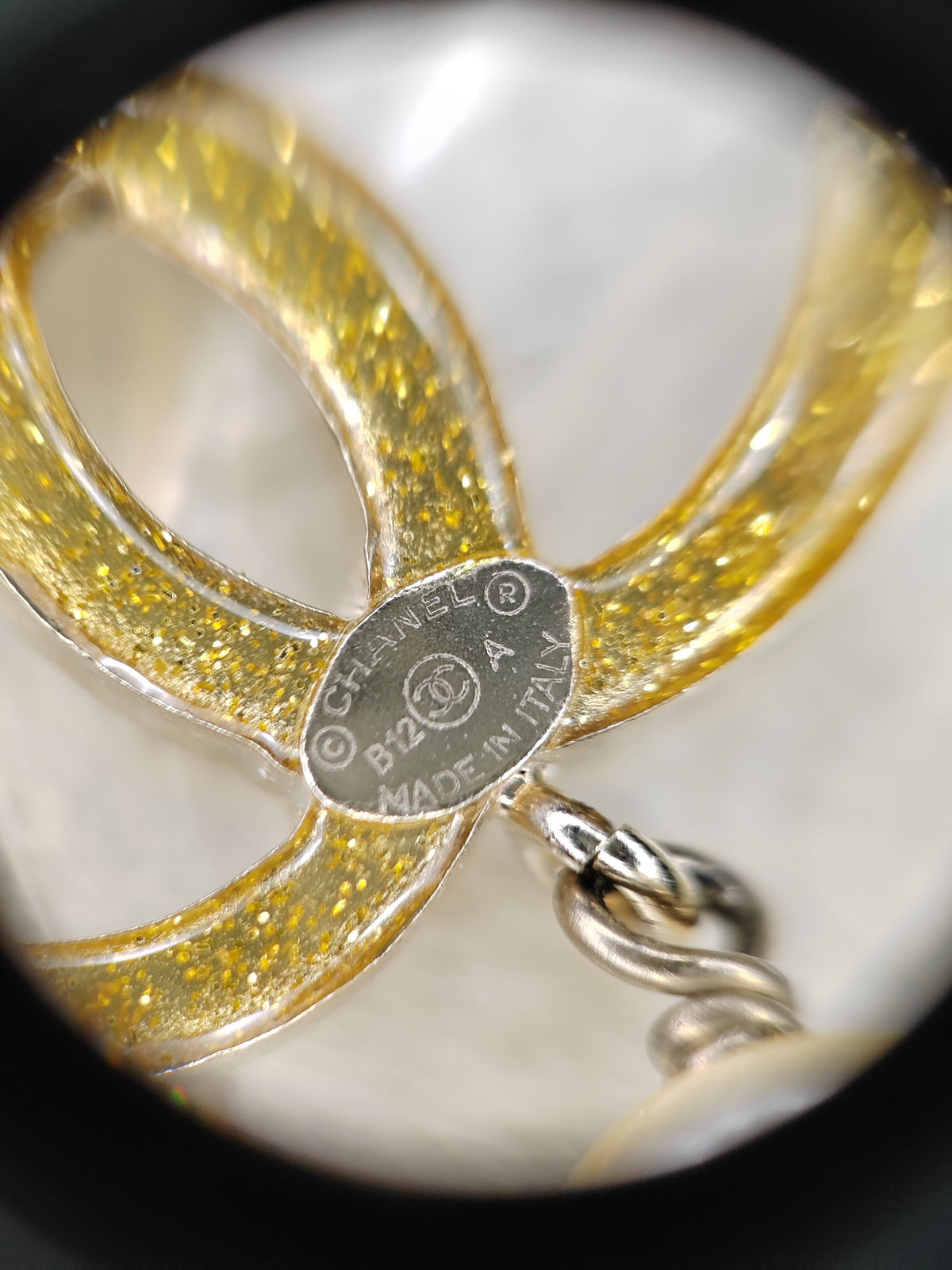 Chanel - Other - Gold-tone base metal with imitation pearls and clear and black rhinestone-style stones. - Multicolour