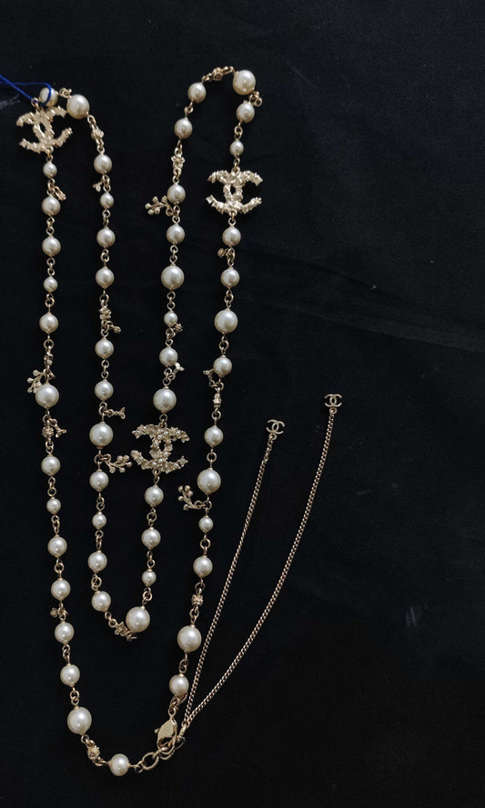 Chanel - Other - Gold-tone base metal with imitation pearls and decorative motifs. - Multicolour