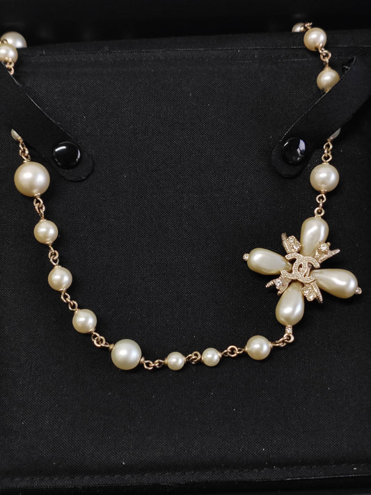 Chanel - Other - Gold-tone base metal with imitation pearls and glass rhinestones. - Multicolour