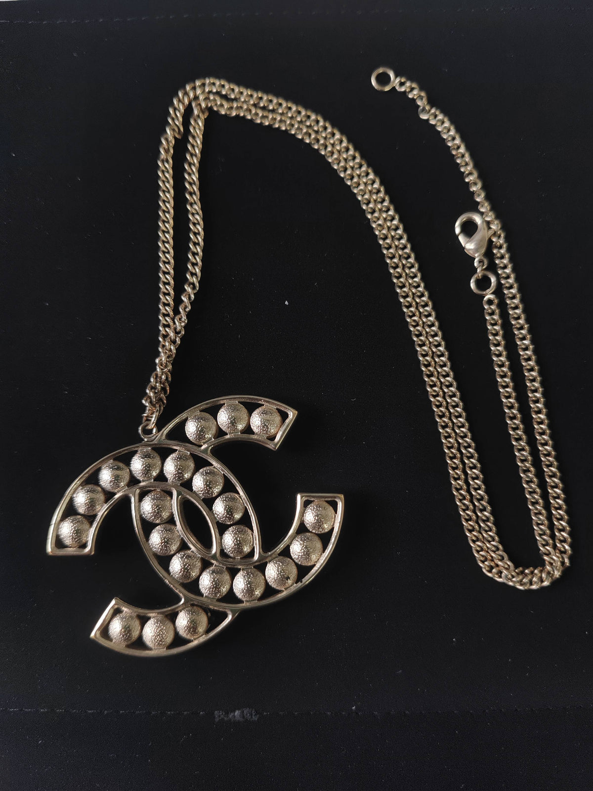 Chanel - Other - Gold-tone base metal with imitation pearls and rhinestone embellishments. - Gold