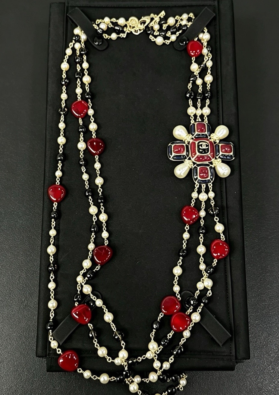 Chanel - Other - Gold-tone base metal with imitation pearls, enamel and resin beads. - Multicolour