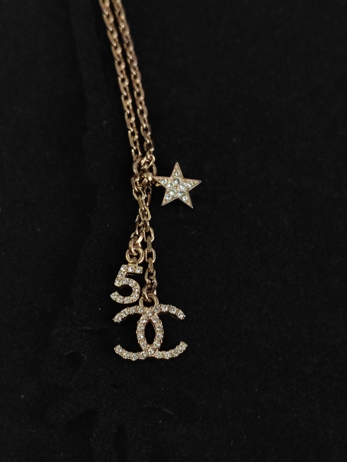 Chanel - Other - Gold-tone base metal with rhinestone-set charms and pearl-like bead accents. - Gold