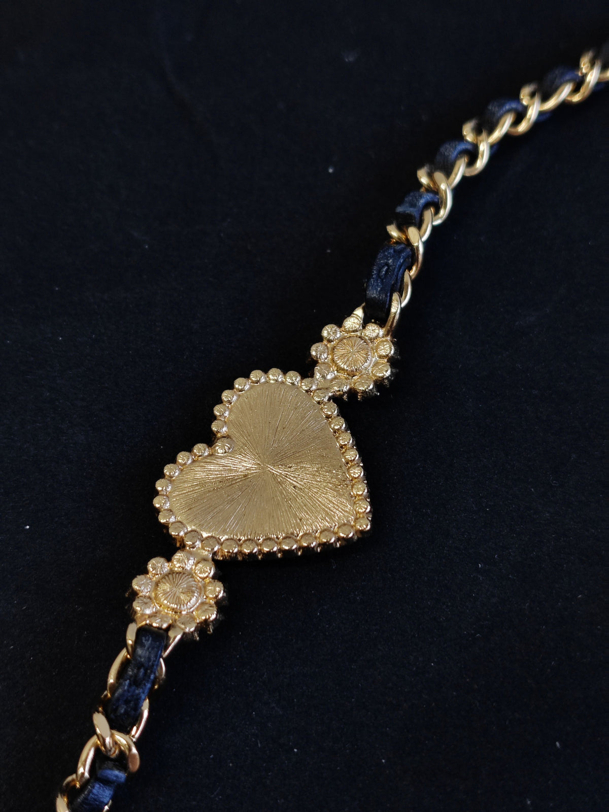 Chanel - Other - Gold-tone base metal with rhinestones and pearl accents; black leather woven through the chain. - Gold