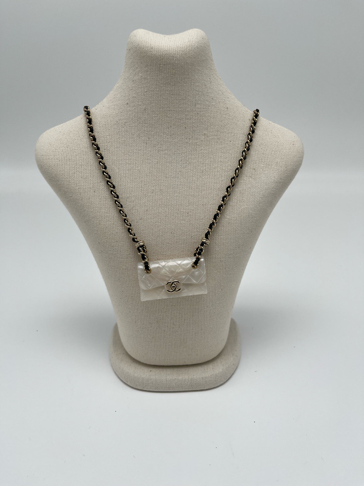 Chanel - Other - Gold-tone metal chain and hardware with a pearlescent white resin pendant. - White - (One size)