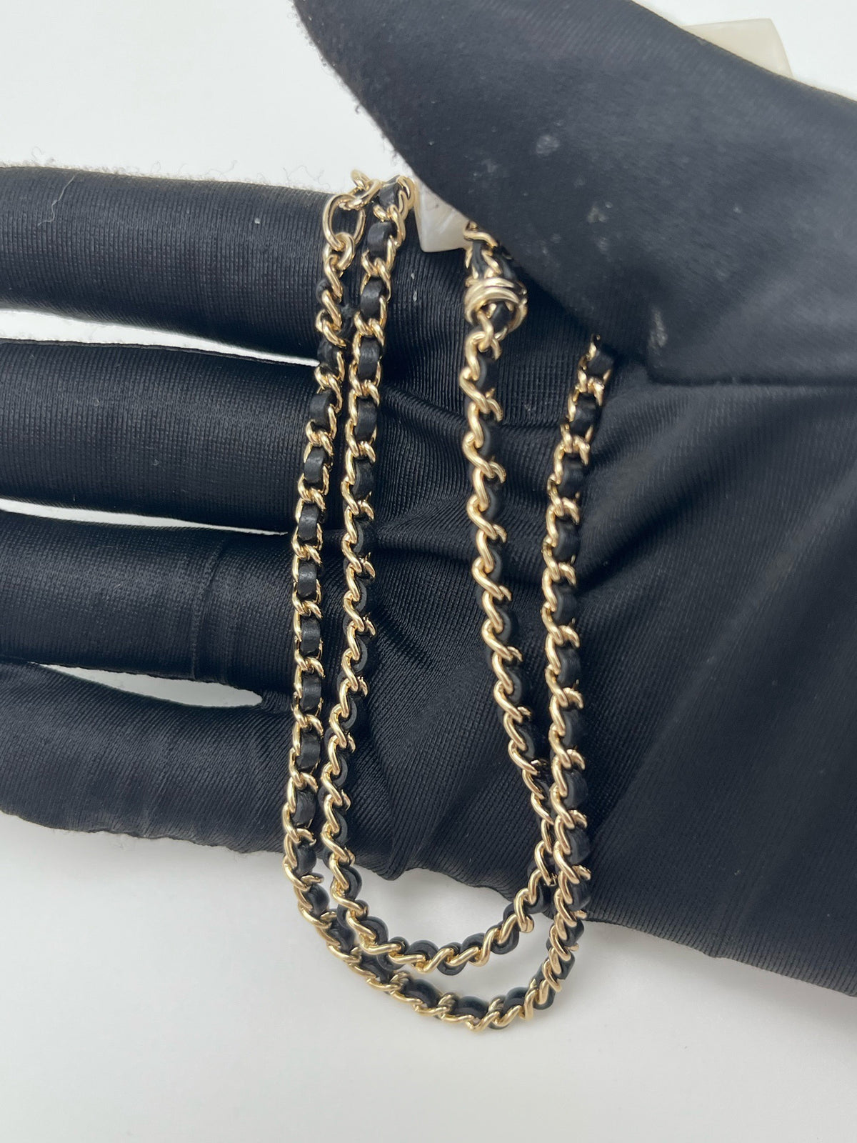 Chanel - Other - Gold-tone metal chain and hardware with a pearlescent white resin pendant. - White - (One size)