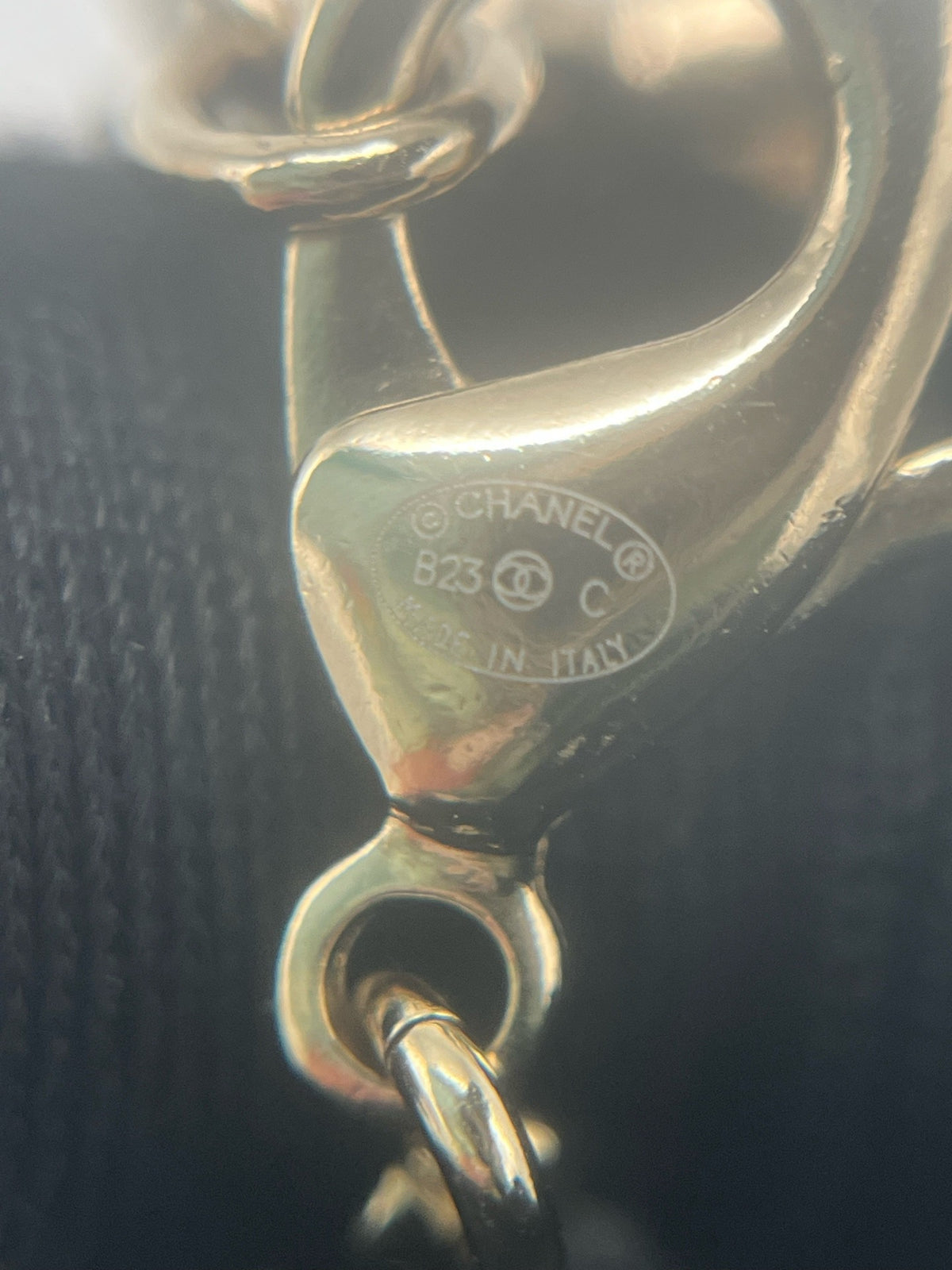 Chanel - Other - Gold-tone metal chain and hardware with a pearlescent white resin pendant. - White - (One size)