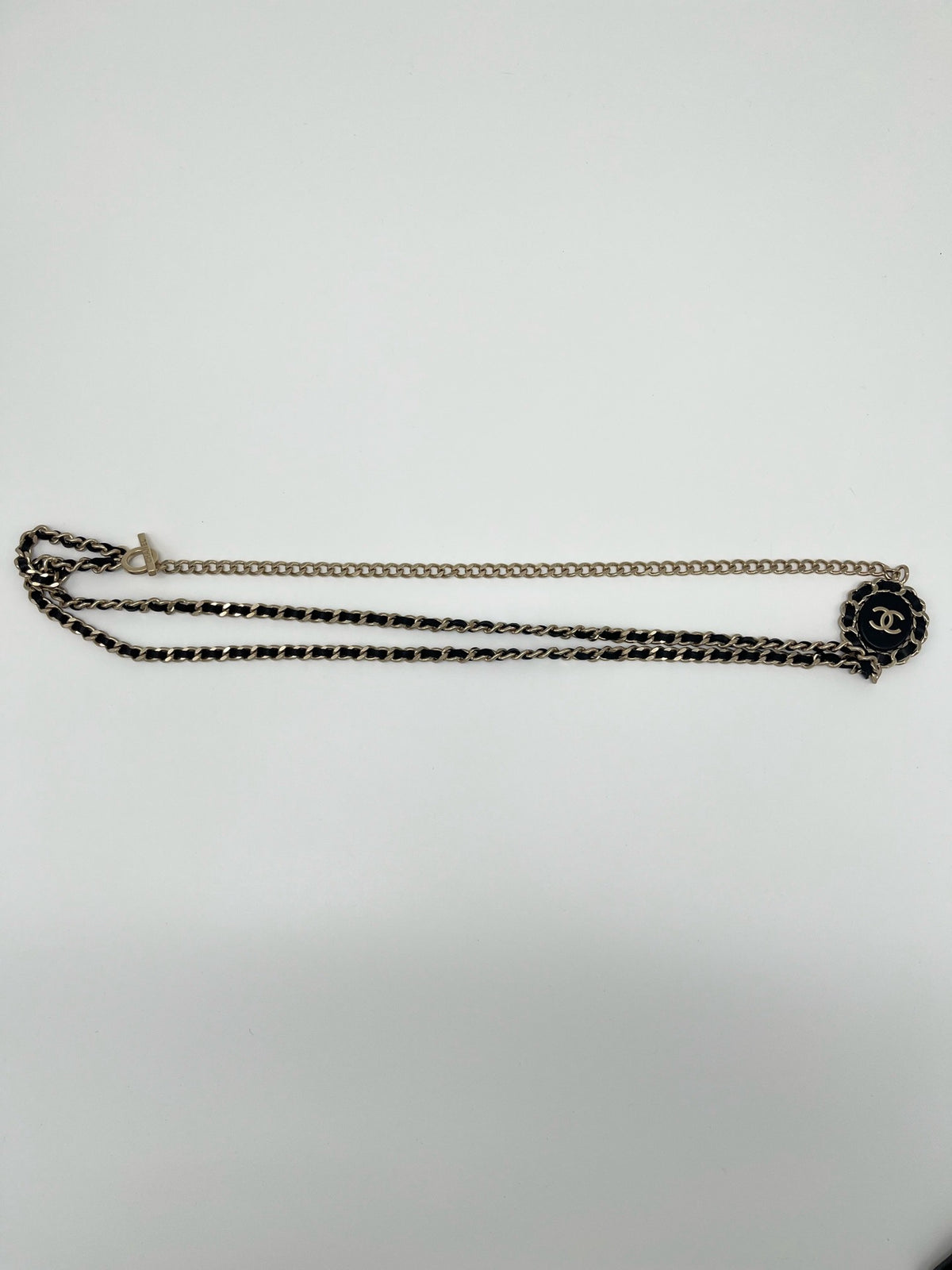 Chanel - Other - Gold-tone metal chain with black leather woven through it. - Multicolour - (Mid-length)