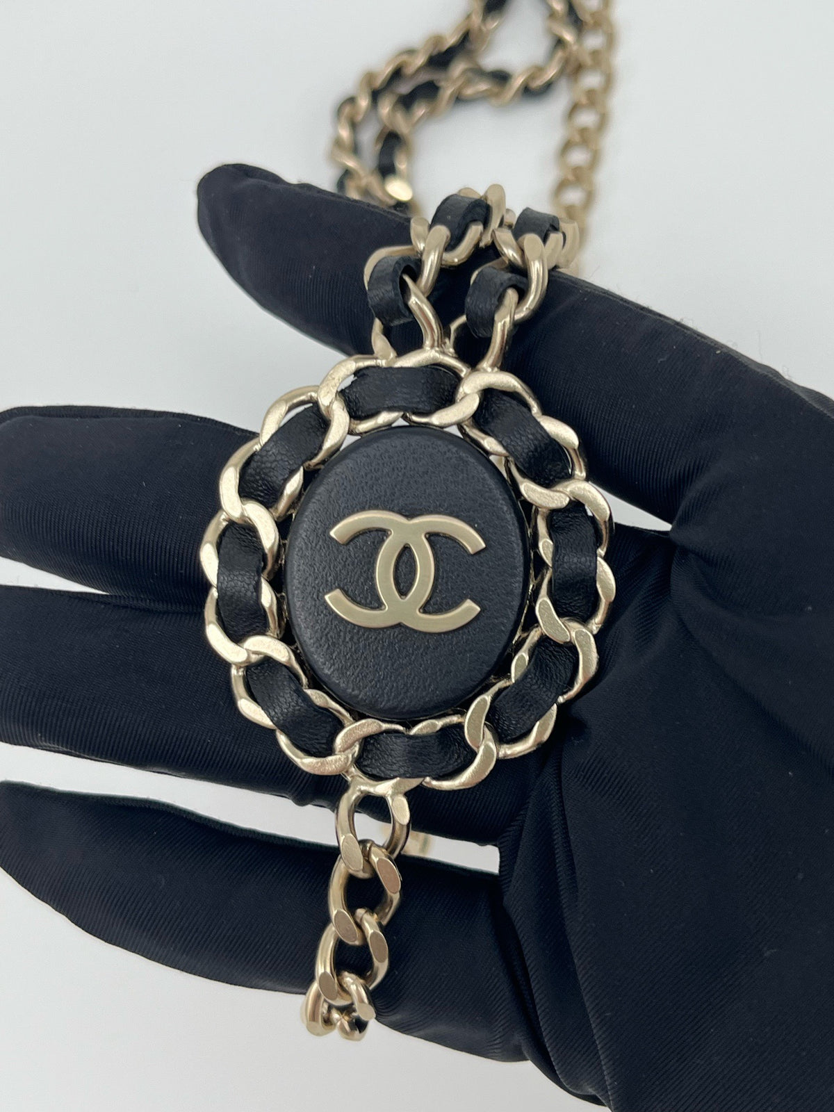 Chanel - Other - Gold-tone metal chain with black leather woven through it. - Multicolour - (Mid-length)