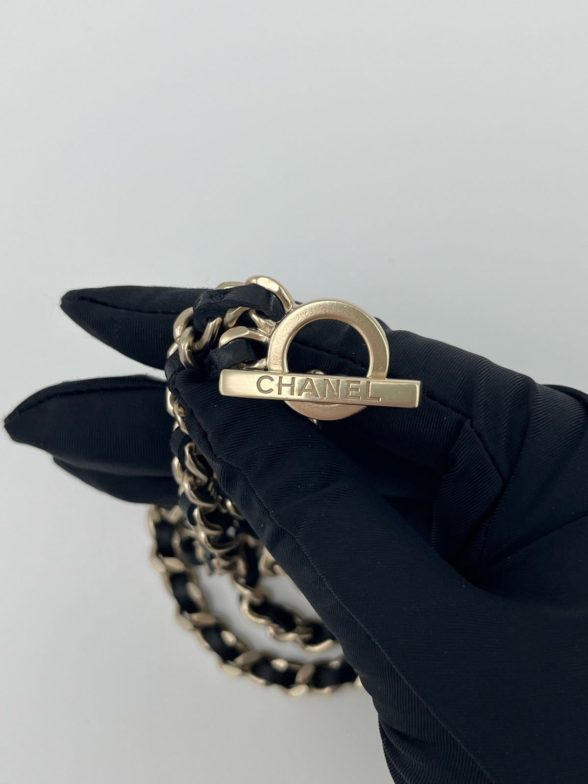 Chanel - Other - Gold-tone metal chain with black leather woven through it. - Multicolour - (Mid-length)