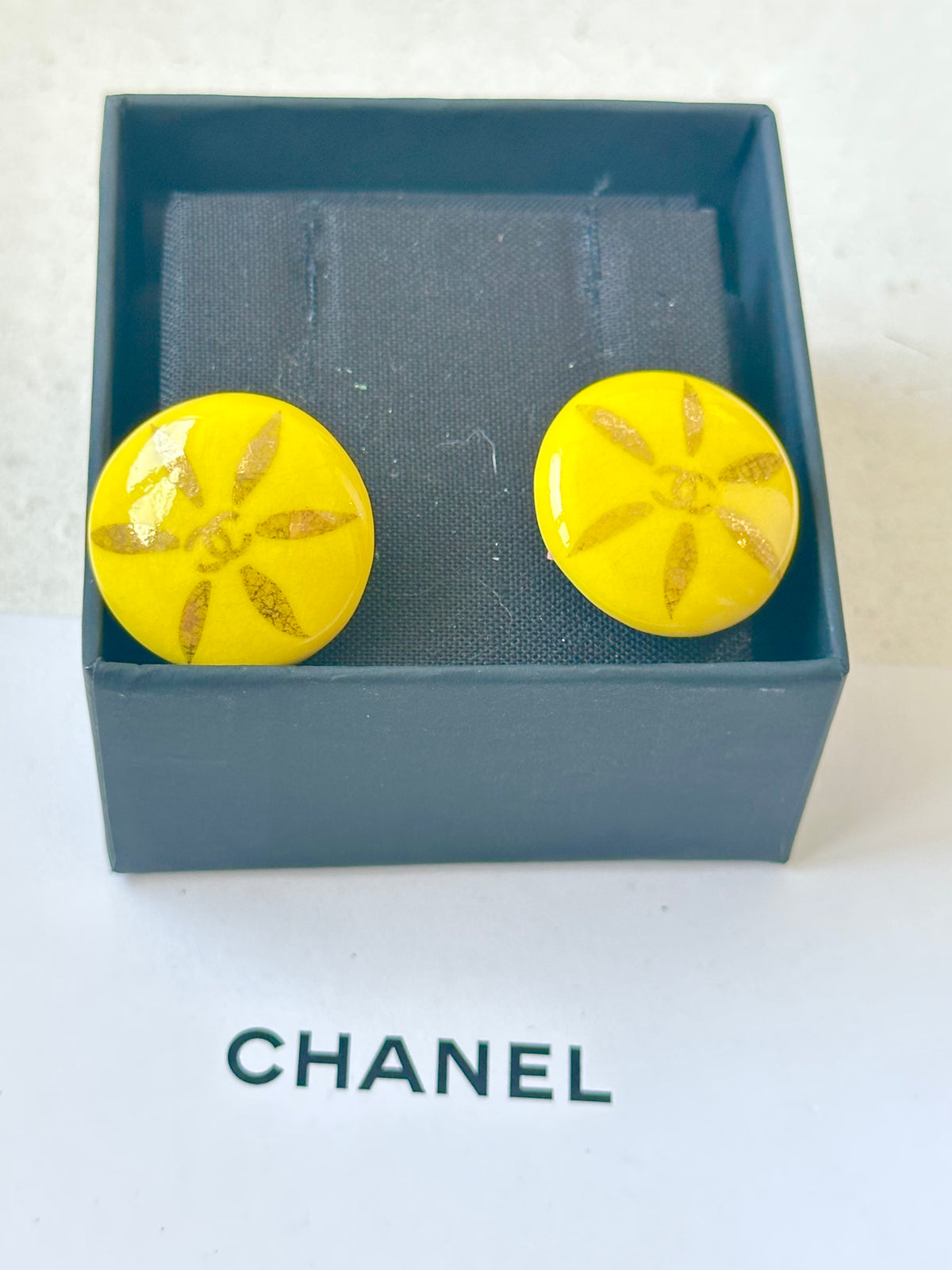Chanel - Other - Gold-tone metal clip fittings with yellow resin-like decorative discs. - Yellow