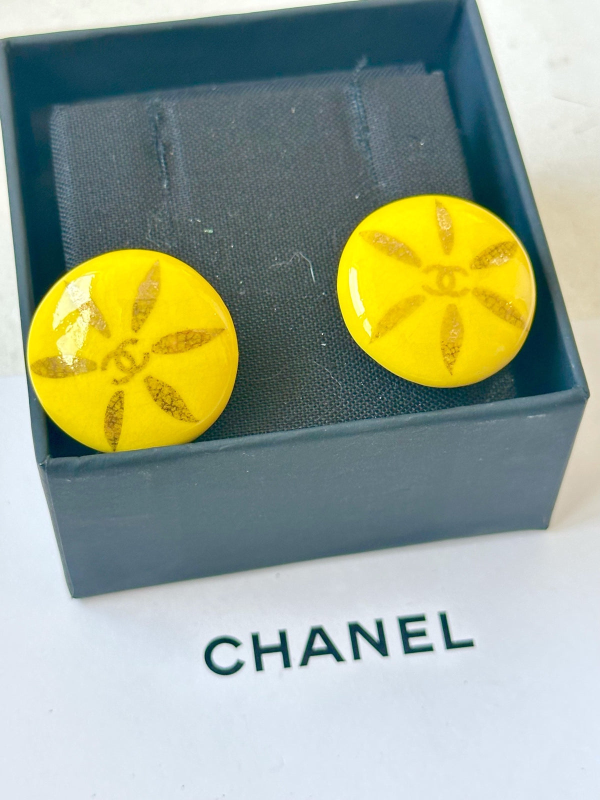 Chanel - Other - Gold-tone metal clip fittings with yellow resin-like decorative discs. - Yellow