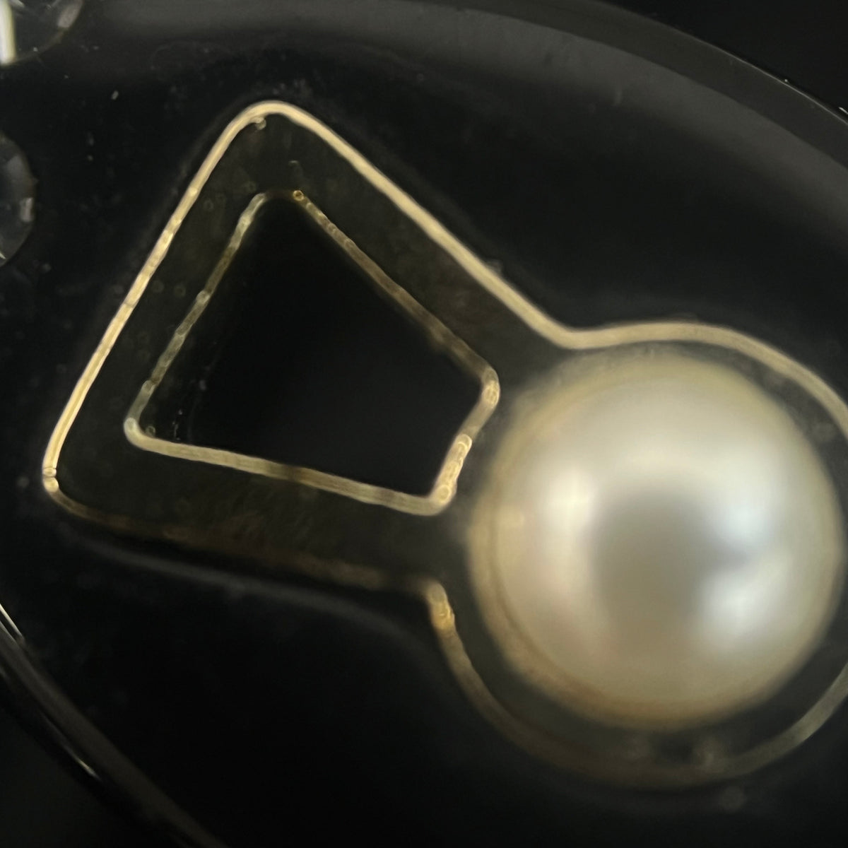 Chanel - Other - Gold-tone metal details with rhinestones, pearl and black resin elements; exact composition not confirmed. - Black