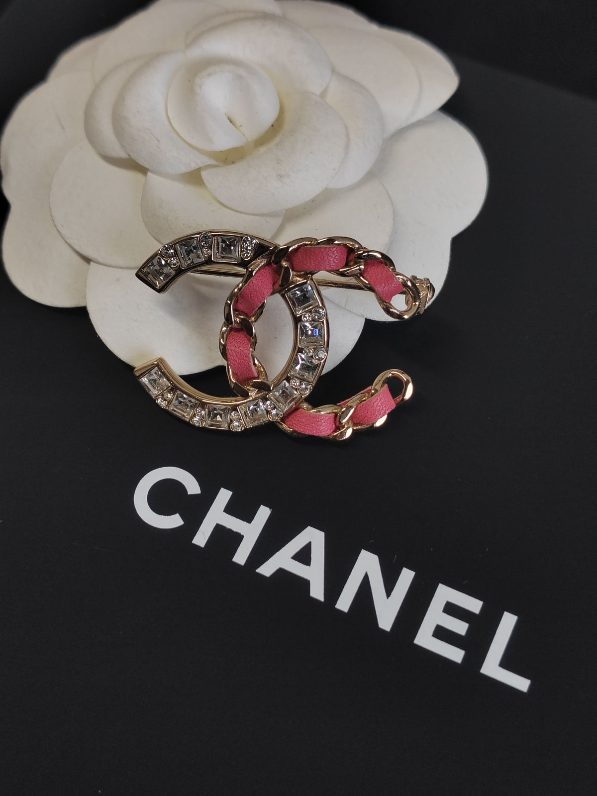 Chanel - Other - Gold-tone metal, rhinestones and pink leather details. - Pink