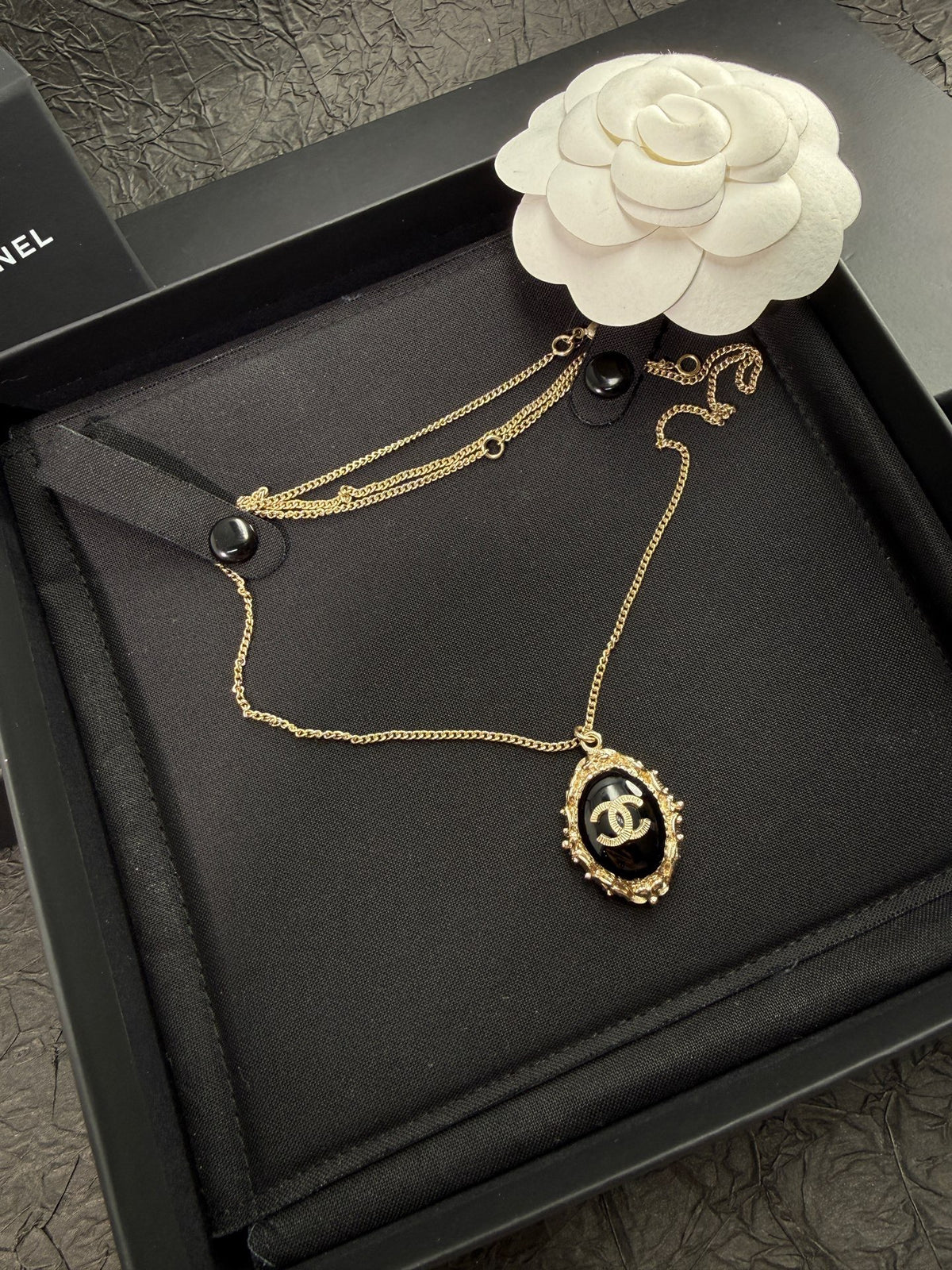 Chanel - Other - Gold-tone metal with a black cabochon; the cabochon composition is unverified. - Multicolour