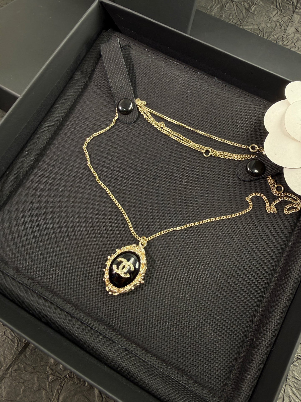 Chanel - Other - Gold-tone metal with a black cabochon; the cabochon composition is unverified. - Multicolour