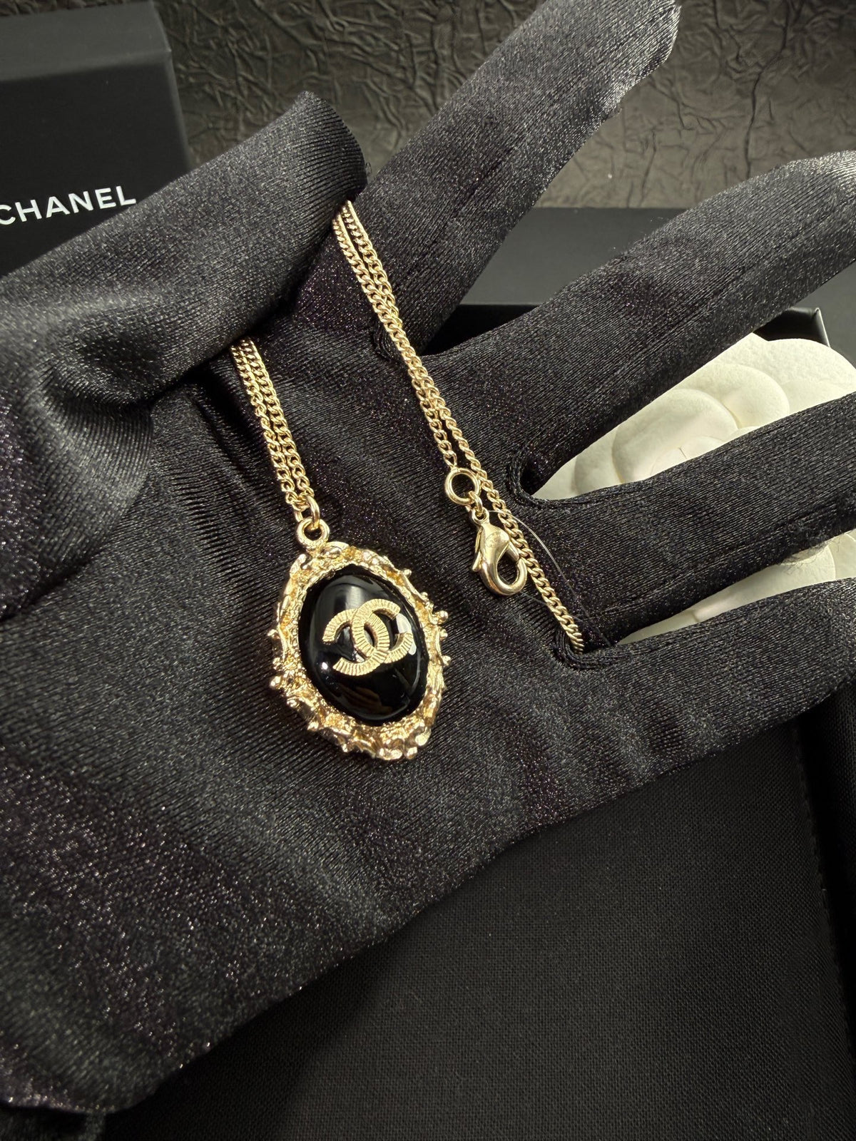 Chanel - Other - Gold-tone metal with a black cabochon; the cabochon composition is unverified. - Multicolour
