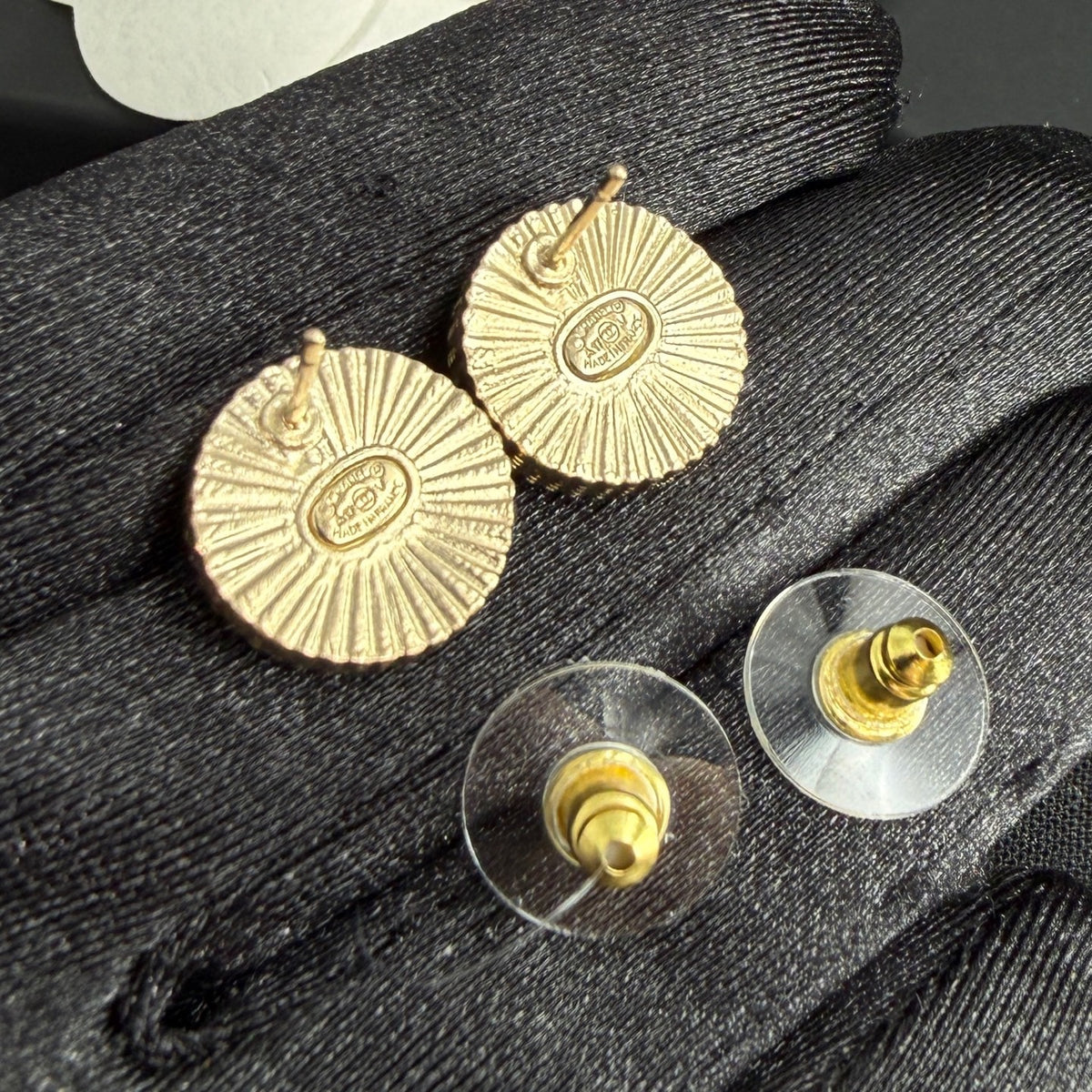 Chanel - Other - Gold-tone metal with a black enamel or resin centre; exact centre material is unconfirmed. - Black